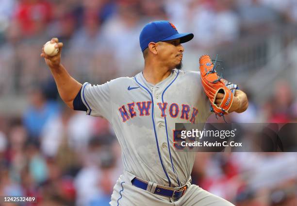 Carlos Carrasco of the New York Mets pitches in the first inning against the Atlanta Braves at Truist Park on August 15, 2022 in Atlanta, Georgia.