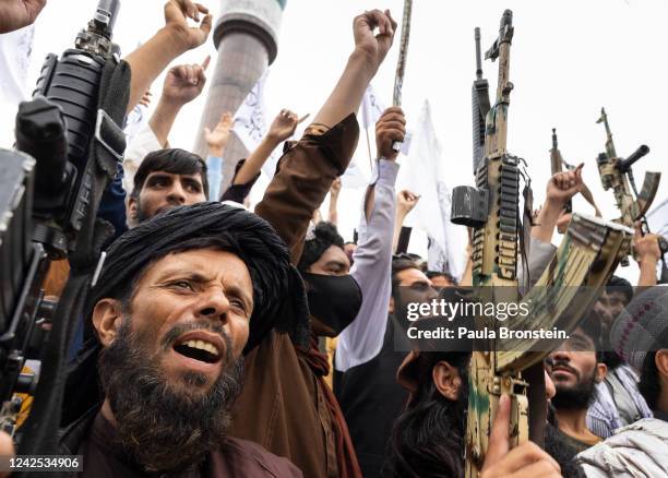 Taliban take to the streets during a national holiday celebrating the first anniversary of the Taliban takeover on August 15, 2022 in Kabul,...