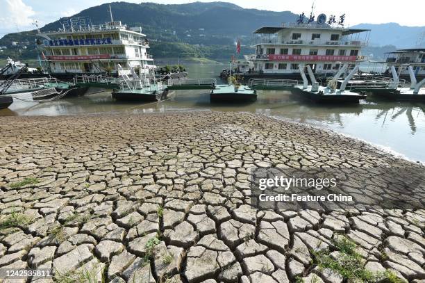 View of the pier sitting on the riverbed after the water level dropped in the Yangtze River in Yunyang county in southwest China's Chongqing...