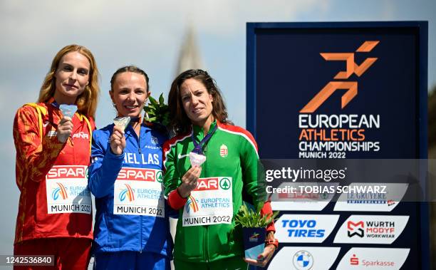 Second placed Spain's Raquel Gonzalez, winner Greece's Antigoni Drisbioti and third placed Hungary's Viktoria Madarasz celebrate on the podium after...