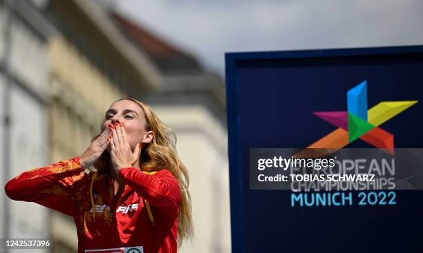 Second placed Spain's Raquel Gonzalez celebrates on the podium after the women's 35km Race Walk during the European Athletics Championships in...