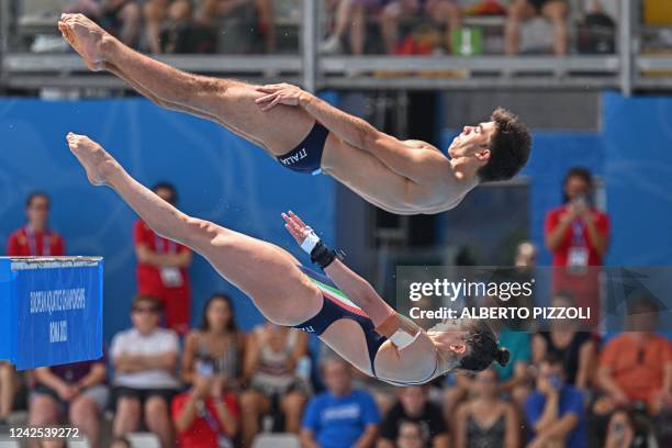 Italy's Sarah Jodoin Di Maria and Eduard Timbretti Gugiu compete during the Diving Mixed Synchronised Platform final event on August 16, 2022 at the...