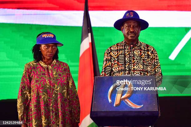 Kenya's defeated presidential candidate Raila Odinga speaks during a press conference, flanked by his running mate Martha Karua , at the Kenyatta...