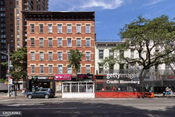 Outdoor dining areas in the Hell's Kitchen neighborhood of New York, US, on Monday, Aug. 15, 2022. A spike in car ownership, dining sheds and the...