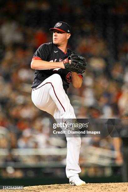 Jake McGee of the Washington Nationals throws a pitch during the seventh inning against the San Diego Padres at Nationals Park on August 12, 2022 in...