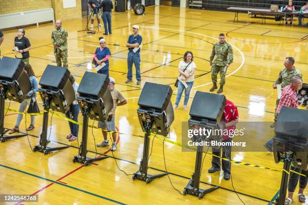 Voters cast ballots at a polling location at the Storey Gym high School in Cheyenne, Wyoming, US, on Tuesday, Aug. 16, 2022. Liz Cheney, who has held...