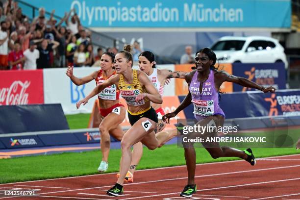 Germany's Gina Luckenkemper competes in the women's 100m final during the European Athletics Championships at the Olympic Stadium in Munich, southern...