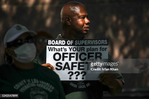 Los Angeles, CA Lorenzo Arnold, a deputy probation officer, right at a rally held by the Coalition of Probation Unions to demand L.A. County Board of...