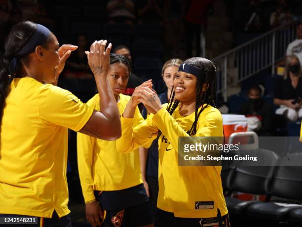 Destanni Henderson of the Indiana Fever walks on to the court prior to the game against the Washington Mystics on August 14, 2022 at Entertainment &...