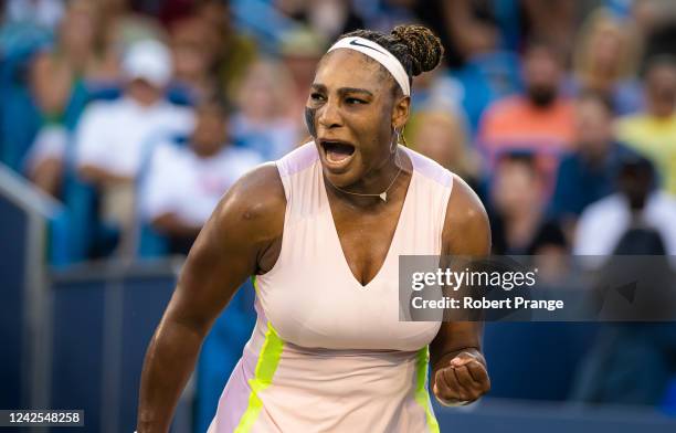 Serena Williams of the United States reacts celebrates winning a point against Emma Raducanu of Great Britain in her first round match on Day 4 of...