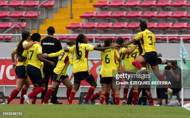 Players of Colombia celebrate after scoring a goal against New Zealand during their Women's U-20 World Cup football match at the National Stadium in...