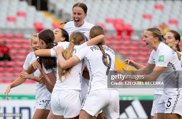 New Zealand's Emily Clegg celebrates with teammates after scoring a goal against Colombia during their Women's U-20 World Cup football match at the...