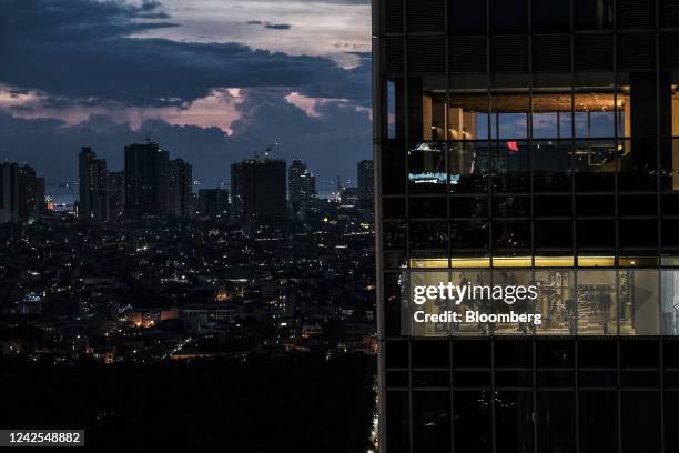 Resident in a gymnasium in a building at dusk in Makati City, the Philippines, on Tuesday, Aug. 16, 2022. The Philippine central bank will sustain...