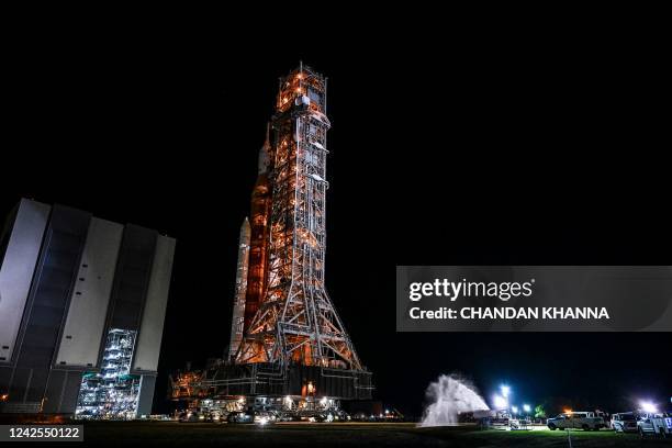 S Artemis I Moon rocket is rolled out to Launch Pad Complex 39B at Kennedy Space Center, in Cape Canaveral, Florida, on August 16, 2022. - Artemis 1,...