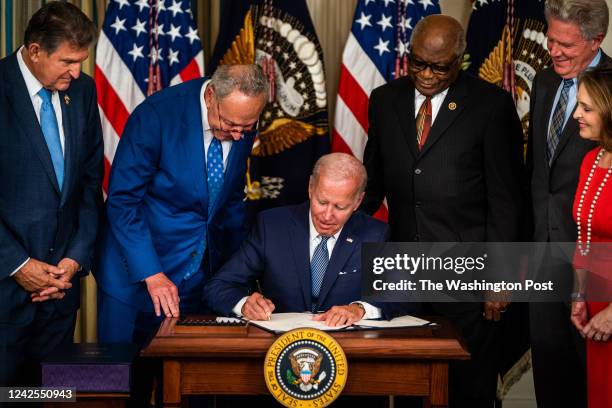 August 16, 2022: US President Joe Biden signs into law H.R. 5376, the Inflation Reduction Act of 2022 in the State Dining Room of the White House on...