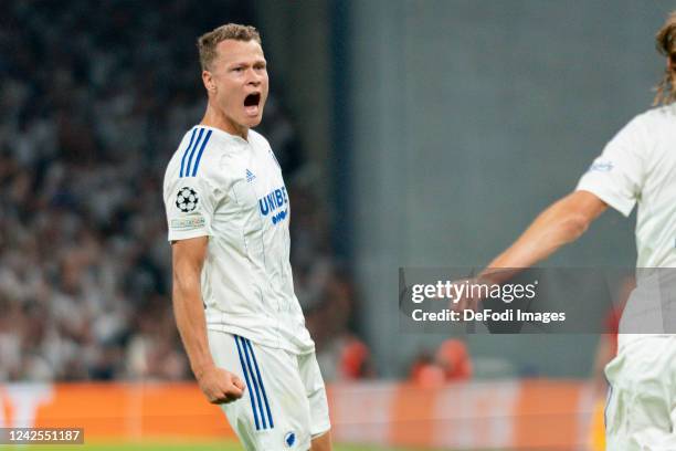 Viktor Claesson of FC Kobenhavn celebrates after scoring his team's first goal with teammates during the UEFA Champions League Play-Off First Leg...