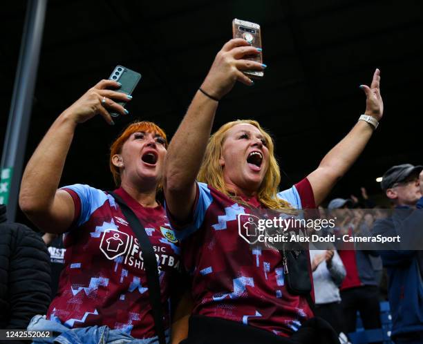 Burnley fans cheer for their side during the Sky Bet Championship between Burnley and Hull City at Turf Moor on August 16, 2022 in Burnley, United...