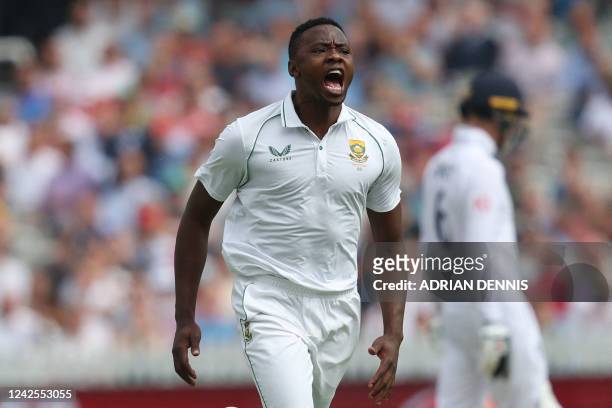 South Africa's Kagiso Rabada celebrates taking the wicket of England's Alex Lees during play on Day 1 of the first Test match between England and...