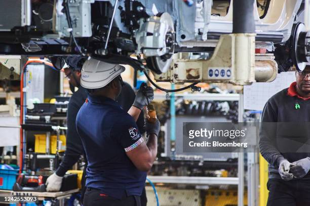 Workers on the automobile assembly line at the Toyota Motor Corp. Manufacturing plant in Durban, South Africa, on Tuesday, Aug. 16, 2022. Floods...