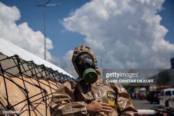 An Ukrainian Emergency Ministry rescuer attends an exercise in the city of Zaporizhzhia on August 17 in case of a possible nuclear incident at the...