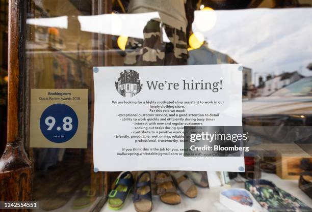 Sign advertising vacancies in the window of an independent store in Whitstable, UK, on Tuesday, Aug 16, 2022. Inflation, which is at...