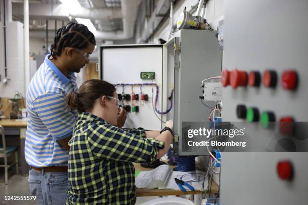 Electrician apprentices practice working on a programmable logic controller at the Kentuckiana Electrical Apprenticeship and Training trade school in...