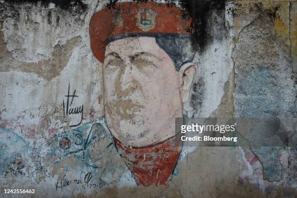 Faded mural of the late Venezuelan President Hugo Chavez in the 23 de Enero district of Caracas, Venezuela, on Tuesday, June 7, 2022. Venezuela's...