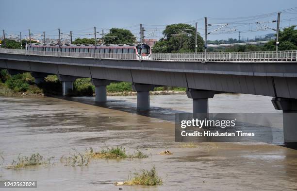 View of the overflowing Yamuna river seen from NH24, on August 17, 2022 in New Delhi, India. Yamuna river has crossed the warning mark of 204.5...