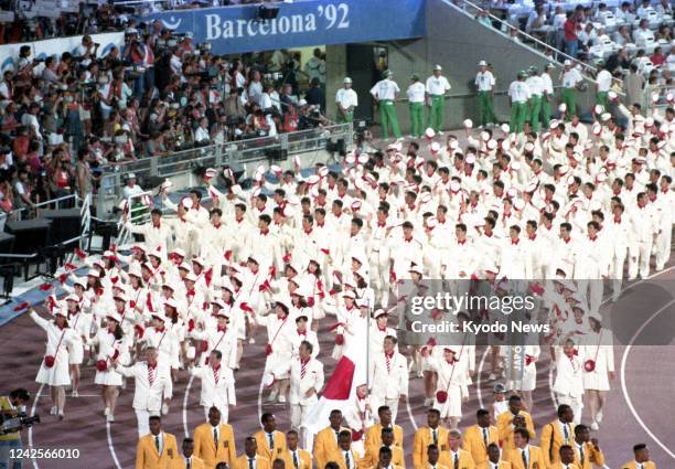 File photo taken July 25 shows Japanese athletes wearing uniforms designed by Hanae Mori during the opening ceremony of the Barcelona Olympics. Mori...