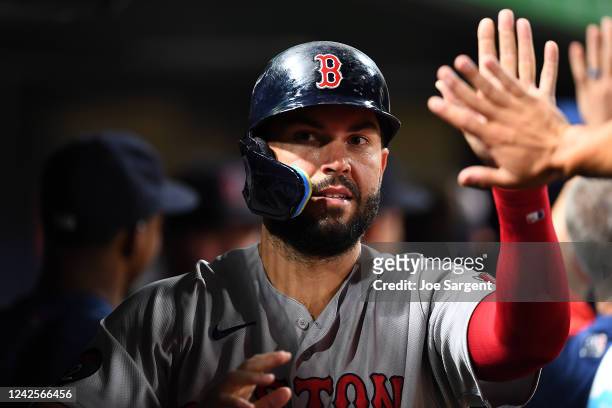 Eric Hosmer of the Boston Red Sox celebrates after scoring in the ninth inning against the Pittsburgh Pirates at PNC Park on August 17, 2022 in...