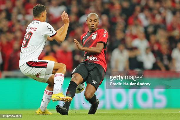 Fernandinho of Athletico Paranaense competes for the ball with Victor Hugo of Flamengo during a Copa Do Brasil Quarter Final second leg match between...