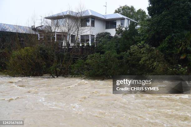 View of raised water levels in the Maitai river in Nelson on August 18 after the city experienced flash floods caused by a storm. - Hundreds of...
