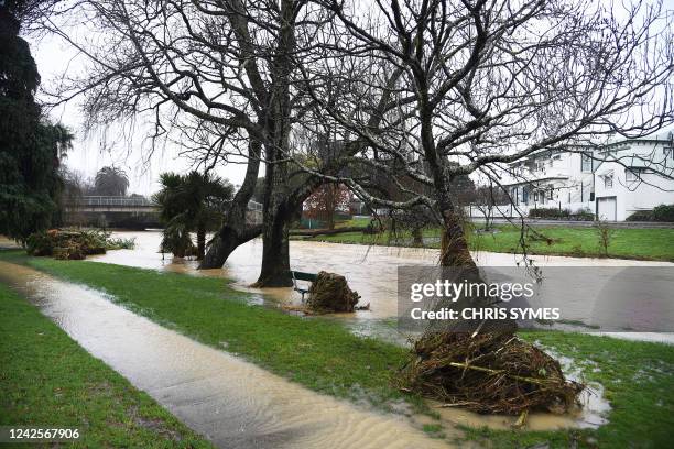 Water is seen on the sidewalks after the Maitai river burst its banks in Nelson on August 18 as the city experienced flash floods caused by a storm....