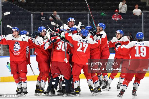 Players of Czechia celebrate after winning the game against the United States in the IIHF World Junior Championship on August 17, 2022 at Rogers...