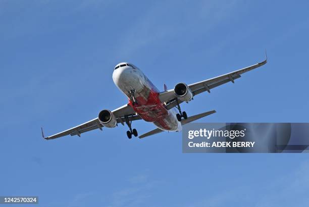 An Air Asia plane prepares to land in Balikpapan, East Kalimantan on August 18, 2022.