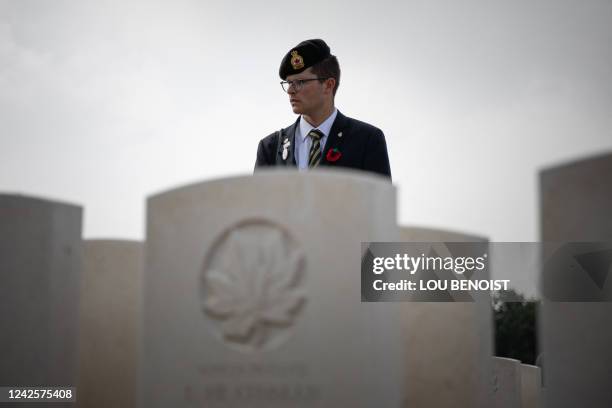 Participant visits graves during the commemoration of the 80th anniversary of Operation Jubilee at the Dieppe Canadian War Cemetery, in...