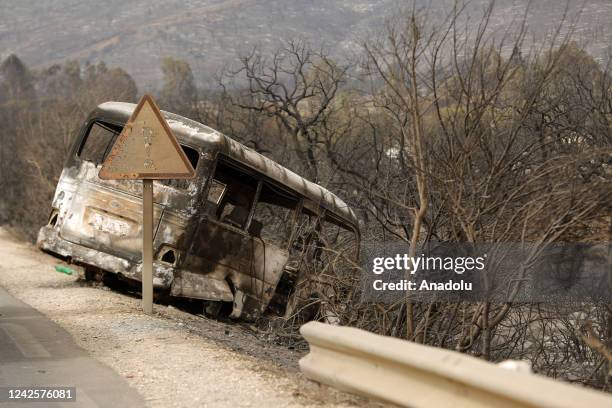 View of burnt bus after wildfires in El Taref, Algeria on August 18, 2022.