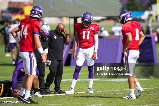 Sean Mannion, Kellen Mond, and Kirk Cousins of the Minnesota Vikings look on during a joint practice with the San Francisco 49ers at training camp at...