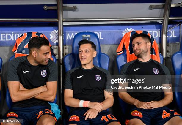 Deniz Turuc , Mesut Özil and Omer Ali Sahiner of Basaksehir are sitting in the bench during the UEFA Europa Conference League 2022/23 Season...