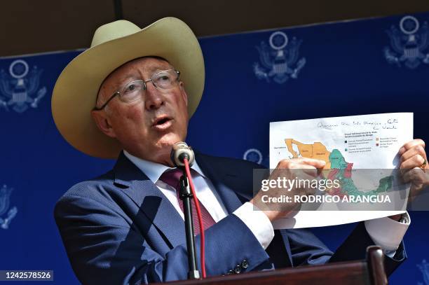 Ambassador to Mexico, Ken Salazar, show the map of Mexico as he speaks during a press conference at his residence in Mexico City on August 18, 2022....