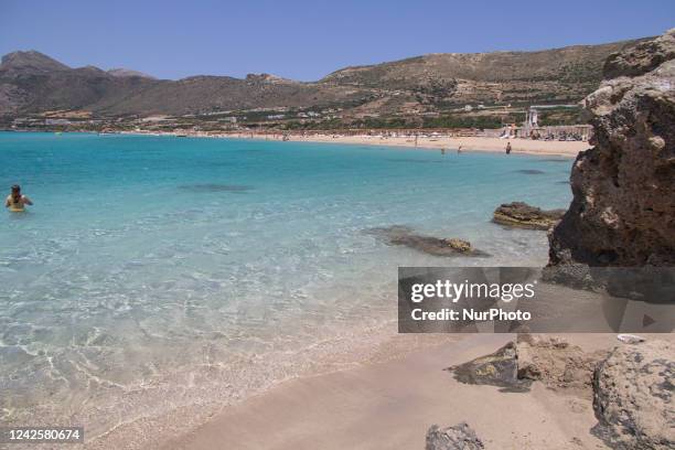 Tourism in Greece - The exotic beach of Falassarna at the western side of Crete island during a high-temperature day, heatwave. Falasarna bay with 5...