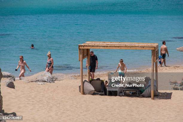 Tourism in Greece - The exotic beach of Falassarna at the western side of Crete island during a high-temperature day, heatwave. Falasarna bay with 5...