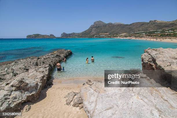 Tourism in Greece - The exotic beach of Falassarna at the western side of Crete island during a high-temperature day, heatwave. Falasarna bay with 5...