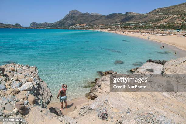 Tourism in Greece - The exotic beach of Falassarna at the western side of Crete island during a high-temperature day, heatwave. Falasarna bay with 5...