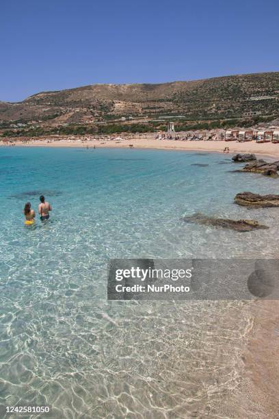 Tourism in Greece - The exotic beach of Falassarna at the western side of Crete island during a high-temperature day, heatwave. Falasarna bay with 5...