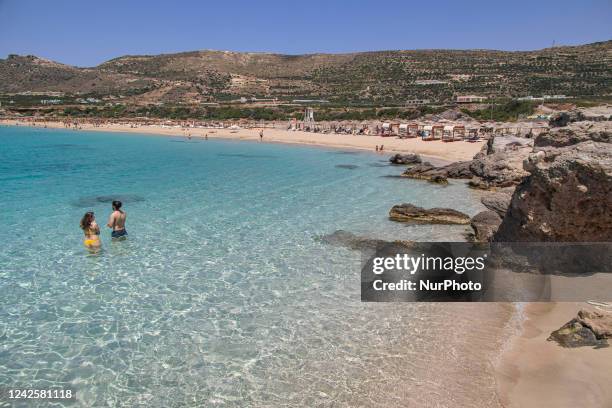 Tourism in Greece - The exotic beach of Falassarna at the western side of Crete island during a high-temperature day, heatwave. Falasarna bay with 5...