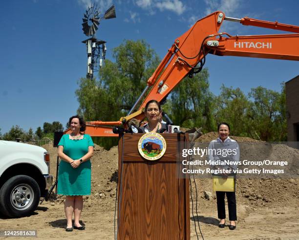 Irvine, CA U.S. Secretary of the Interior Deb Haaland, center, addresses the media as she stands with Congresswoman Katie Porter , left, and Camille...