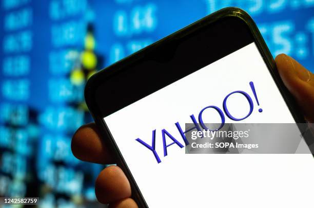 In this photo illustration, the American web services provider company Yahoo! logo is displayed on a smartphone screen.