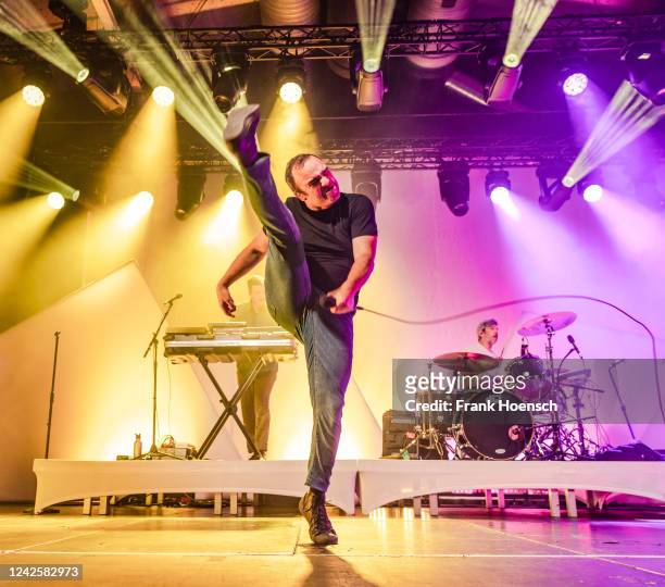 Singer Samuel T. Herring of the American band Future Islands performs live on stage during a concert at the Columbiahalle on August 18, 2022 in...