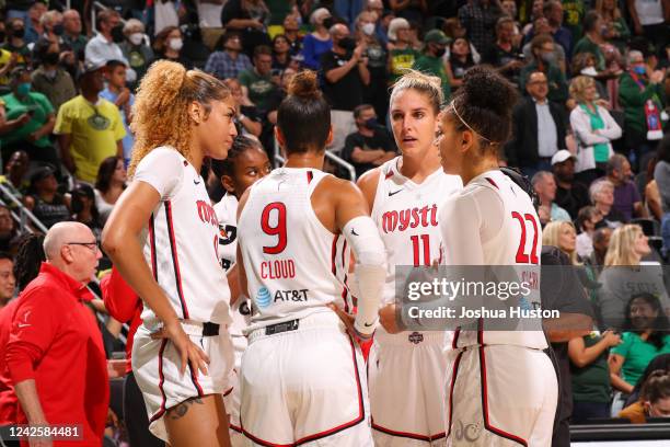 The Washington Mystics huddle up during Round 1 Game 1 of the 2022 WNBA Playoffs on August 18, 2022 at the Climate Pledge Arena in Seattle,...